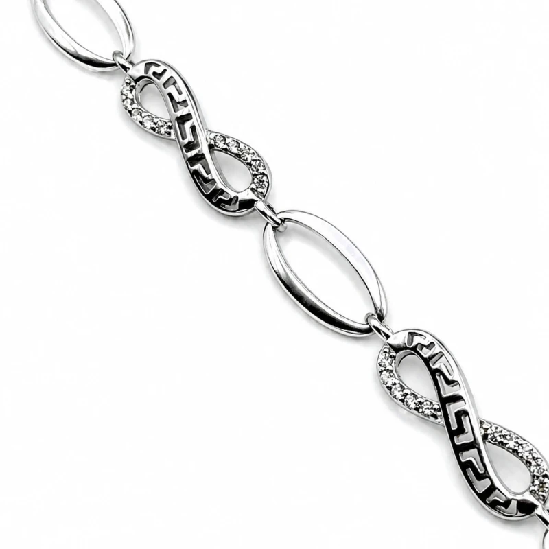 Bransoletka srebrna 925 nieskończoność grecki wzór cyrkonie 18+3 cm 6,6 g ciężka